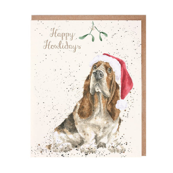 A Christmas greeting card featuring a dog wearing a Christmas cap