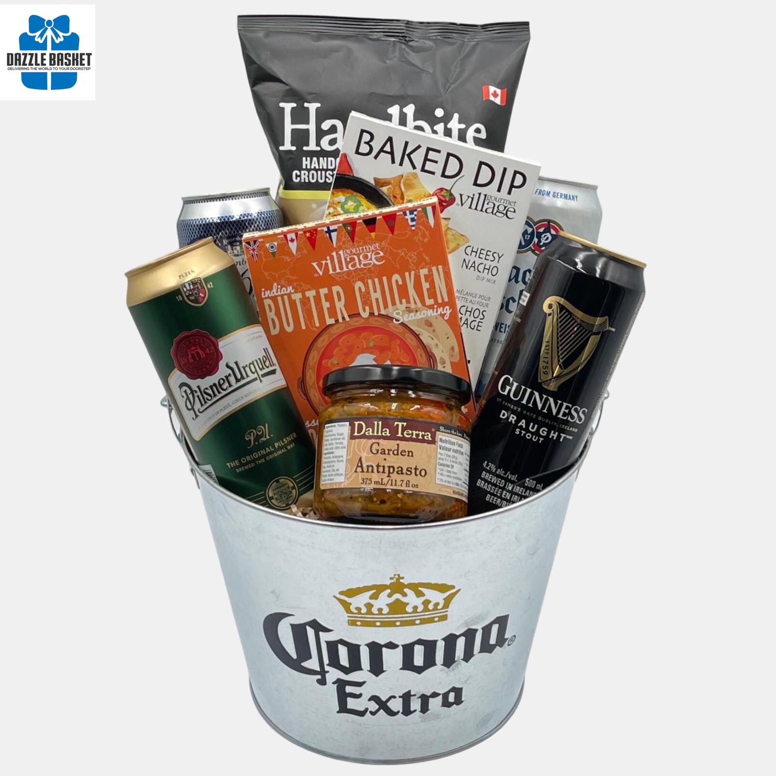 A made in Calgary beer gift basket made in a metal container that contains four cans of premium beer, chips and other food products.
