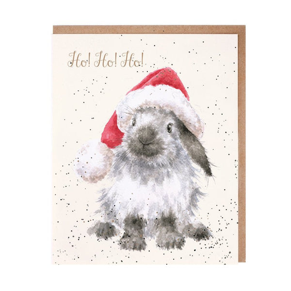 A Christmas greeting card featuring a bunny wearing a Christmas cap