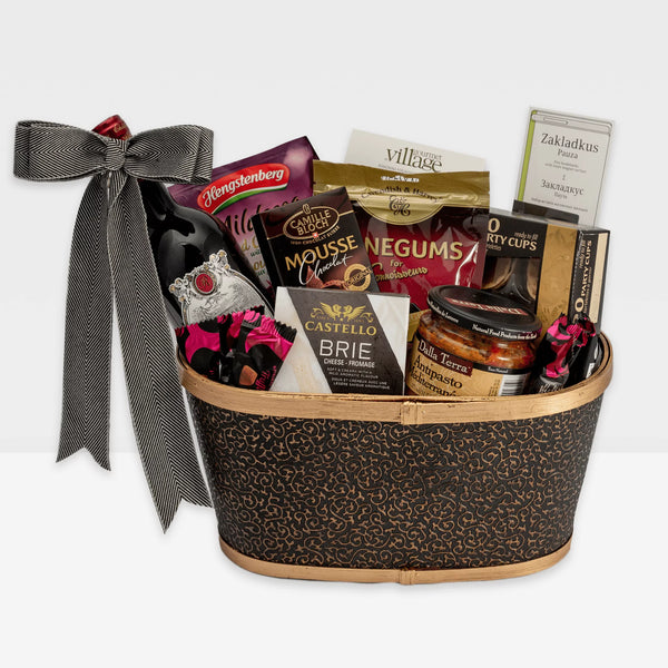 Finest wine gift basket Calgary offers that includes a bottle of wine and delicious gourmet snacks.