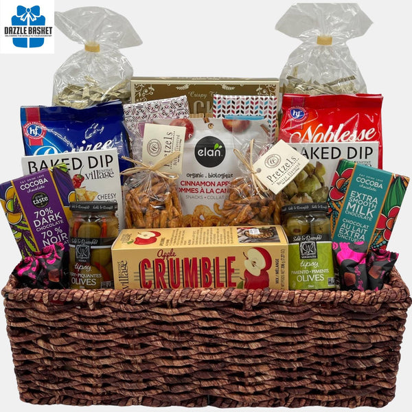 A stupendous made in Calgary gourmet gift basket with delicious gourmet snacks in a large willow baskets