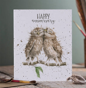 A greeting that has 2 cuddling owls and front of the card reads "Happy Anniversary"