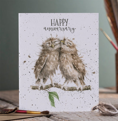 A greeting that has 2 cuddling owls and front of the card reads "Happy Anniversary"