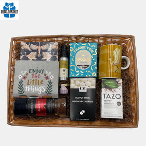 A made in Calgary Appreciation basket that includes a wide range of useful products made in a large willow basket.
