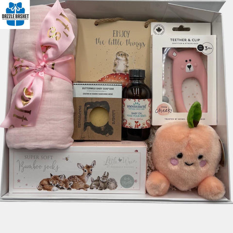 A made in Calgary beautiful gift box for a baby girl. It includes everything that baby will need during the first few months. Great gift for newborn.