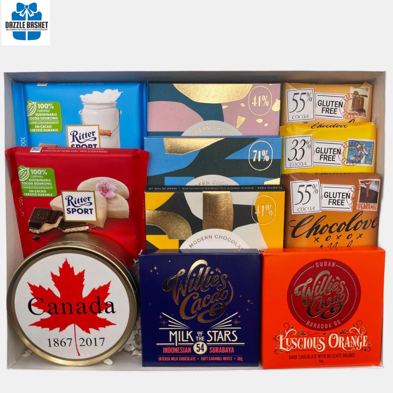 A made in Calgary chocolate gift basket that includes top of the line handmade chocolates in a rectangular white box with see through top.