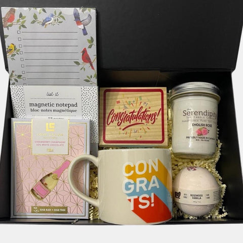 A Congratulations gift box that includes a Congratulations plaque, a Congratulations mug along with number of other products to make the recipient feel extra special.