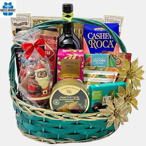One of the best holiday themed gift baskets Calgary offers - Dazzle Basket- It includes a bottle of wine and delicious gourmet snacks in a beautiful green basket with golden trim.