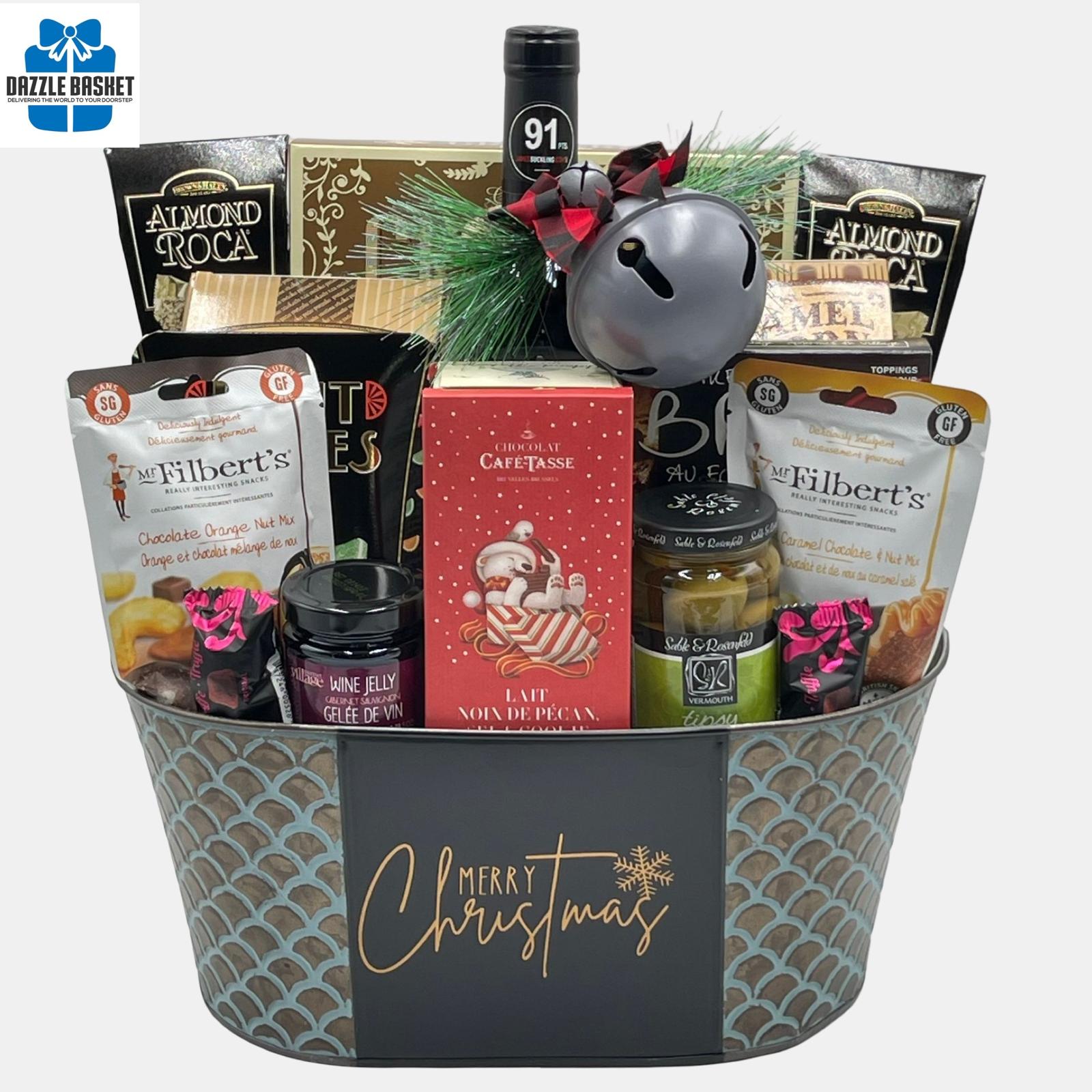 One of the finest gift baskets Calgary offers- Merry Christmas holiday gift basket includes a bottle of wine and tasty gourmet snacks from top brands.