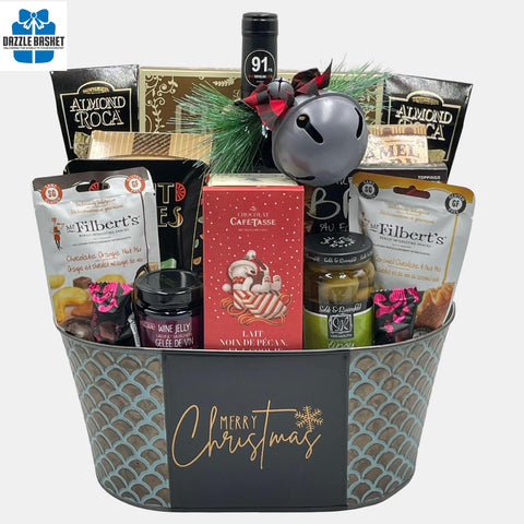 One of the finest gift baskets Calgary offers- Merry Christmas holiday gift basket includes a bottle of wine and tasty gourmet snacks from top brands.
