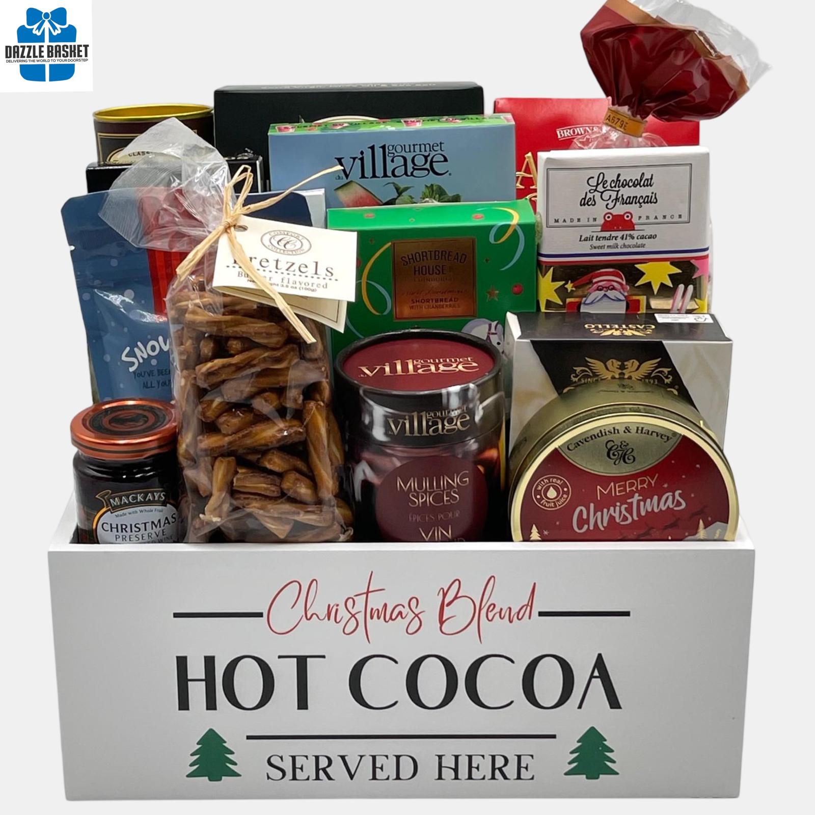 A Calgary Holiday gift baskets comprising of holiday themed gourmet snacks packed neatly in a rectangular white container