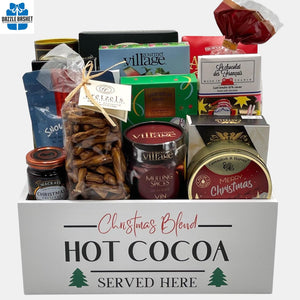A Calgary Holiday gift baskets comprising of holiday themed gourmet snacks packed neatly in a rectangular white container