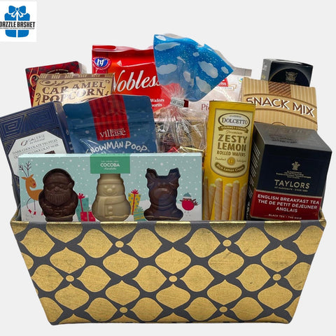 A made in Calgary gourmet gift basket with delicious snacks arranged neatly in a golden fabric container.