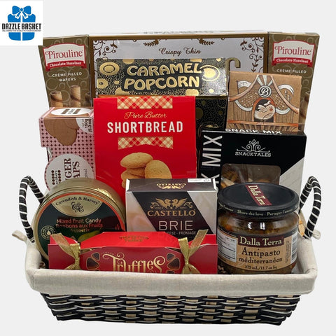 A made in Calgary gourmet gift basket that includes top of the line delicious gourmet snacks in a rectangular basket with red liner.