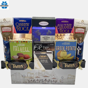 A made in Calgary gift basket that includes delicious gourmet snacks organized neatly in a white box. Free same day delivery.