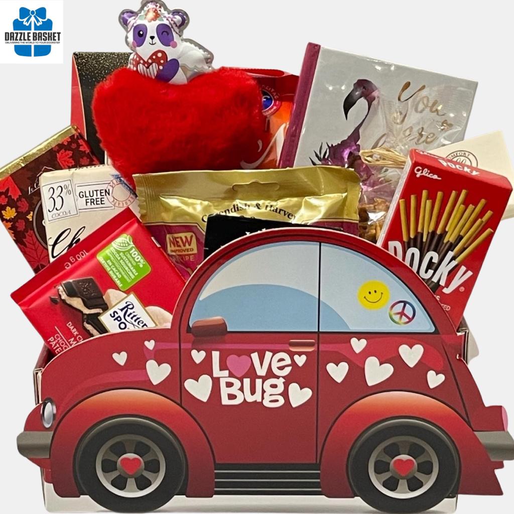 GIft baskets calgary from Dazzle Basket- Great Valentine Day gift that includes lots of chocolates and delicious food products in a beetle car shaped box with Love Bug written on it.