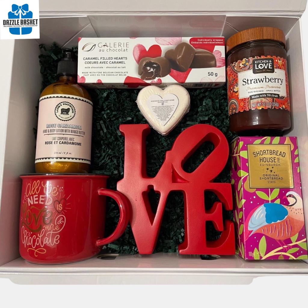 Finest Gift Baskets Calgary from Dazzle Basket: A perfect made in Calgary love gift box that includes love themed  products including chocolate, candies, mug and spa products.