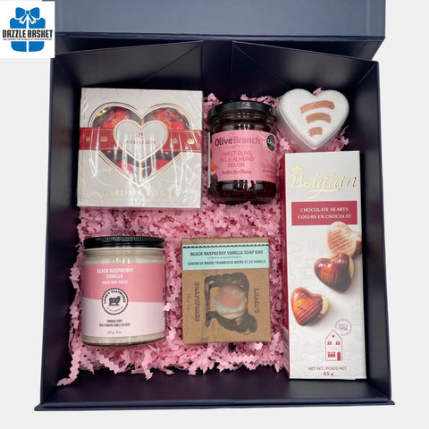 A Calgary gift box that includes chocolates and spa products packed in a magnetic cardboard box. 
