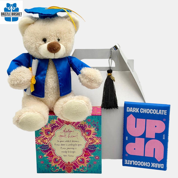 Teddy bear in graduation attire with a tassel, large sticky note box, and 'UP' chocolate bar on a white background.