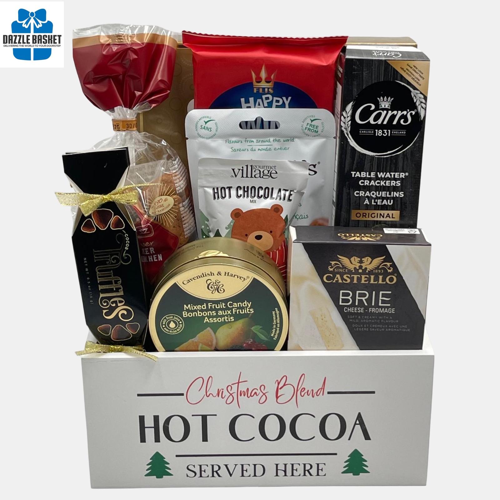 Gift baskets Calgary from Dazzle Basket- A holiday gift basket filled with delicious food snacks in  a Christmas themed white wooden crate