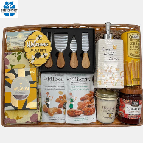 A made in Calgary housewarming gift basket that includes gourmet sweet and quality household  products that make for a perfect new homeowner gift.