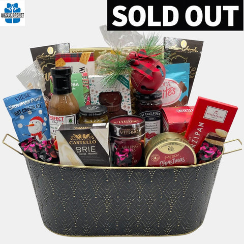 Gift baskets Calgary from Dazzle Basket- A collection of tasty food products with wine arranged neatly in a black gold container.