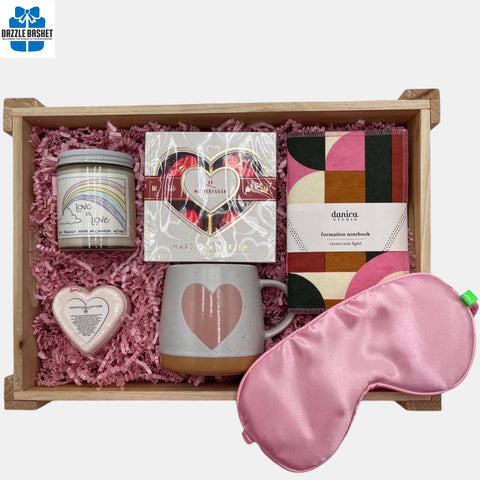 Calgary gift basket made in a wooden crate with chocolates & spa products aesthetically arranged in the wooden tray.