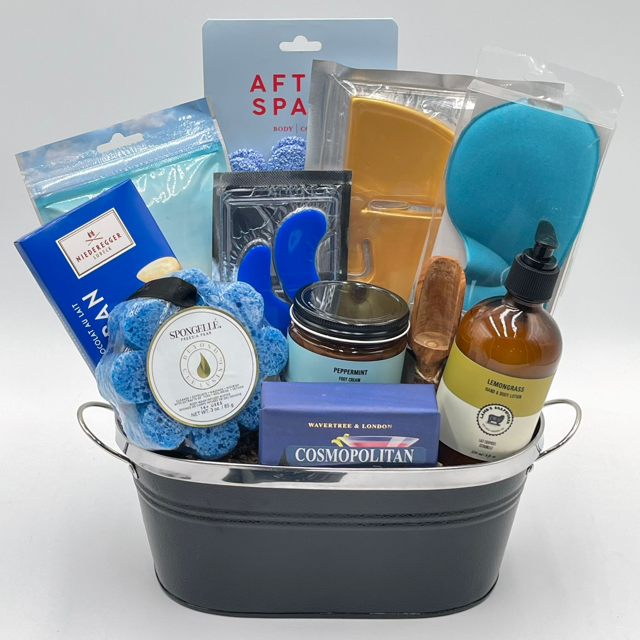 A Calgary spa gift basket that includes quality spa products for men packed in a beautiful black metal container.