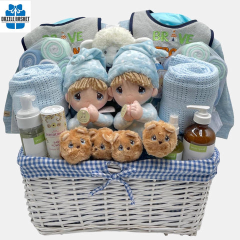A made in Calgary twins gift basket that includes top of the line baby products including blanket, baby care products, plush toys that the twins will need during their first few months.