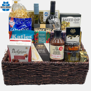Award winning wines with tasty gourmet snacks placed perfectly in a XL size corn market tray make up this  very popular made in Calgary wine gift basket.