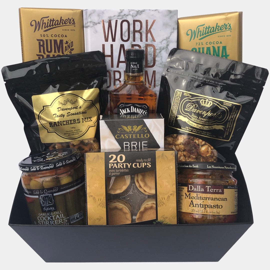 A perfect made in Calgary whiskey gift basket that is overflowing with delicious gourmet products that can be savored with a round of Jack Daniel scotch whiskey included in the basket.