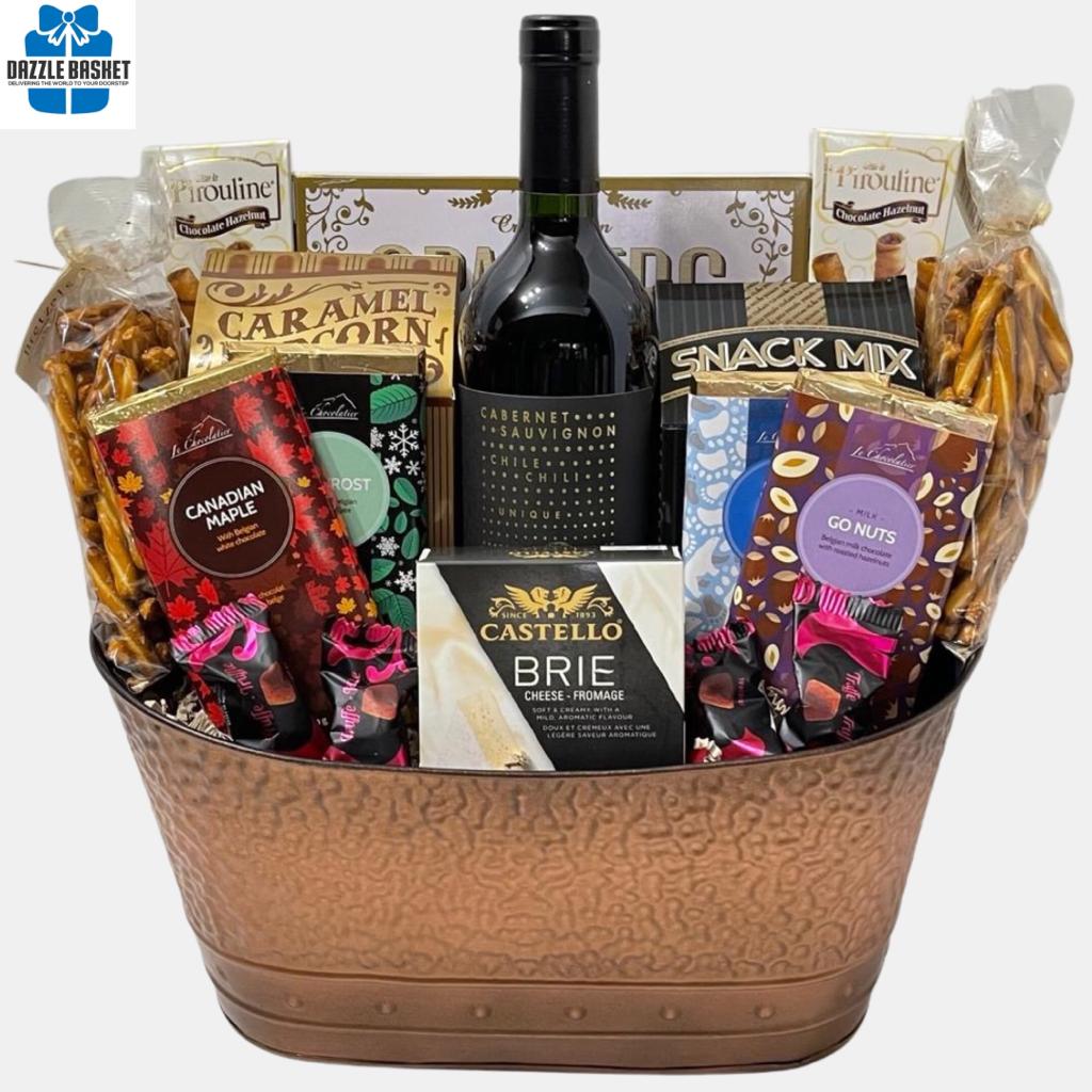 Finest wine gift baskets Calgary offers- Dazzle Basket-Tuscan wine gift basket includes a bottle of wine with tasty gourmet snacks placed perfectly in a beautiful metal container make up this  very popular made in Calgary wine gift basket