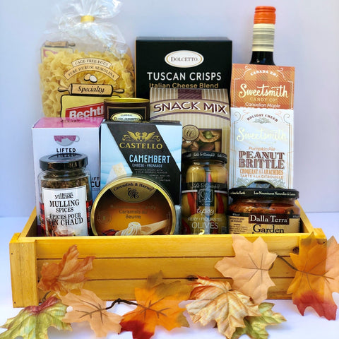An award winning wine with tasty gourmet snacks placed perfectly in a beautiful metal container make up this  very popular made in Calgary wine gift basket.