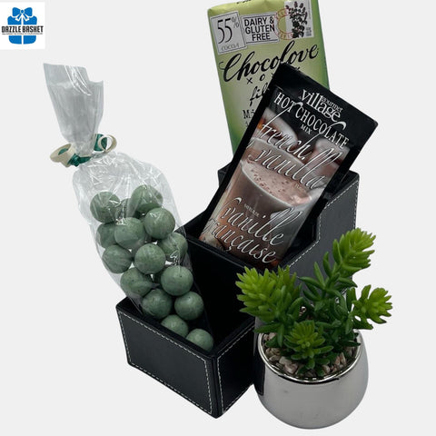 Finest Thanks gift Calgary offers from Dazzle Basket- This Thank you gift includes an organizer, artificial potted plants, tasty chocolates and hot chocolate for the recipient to relish.