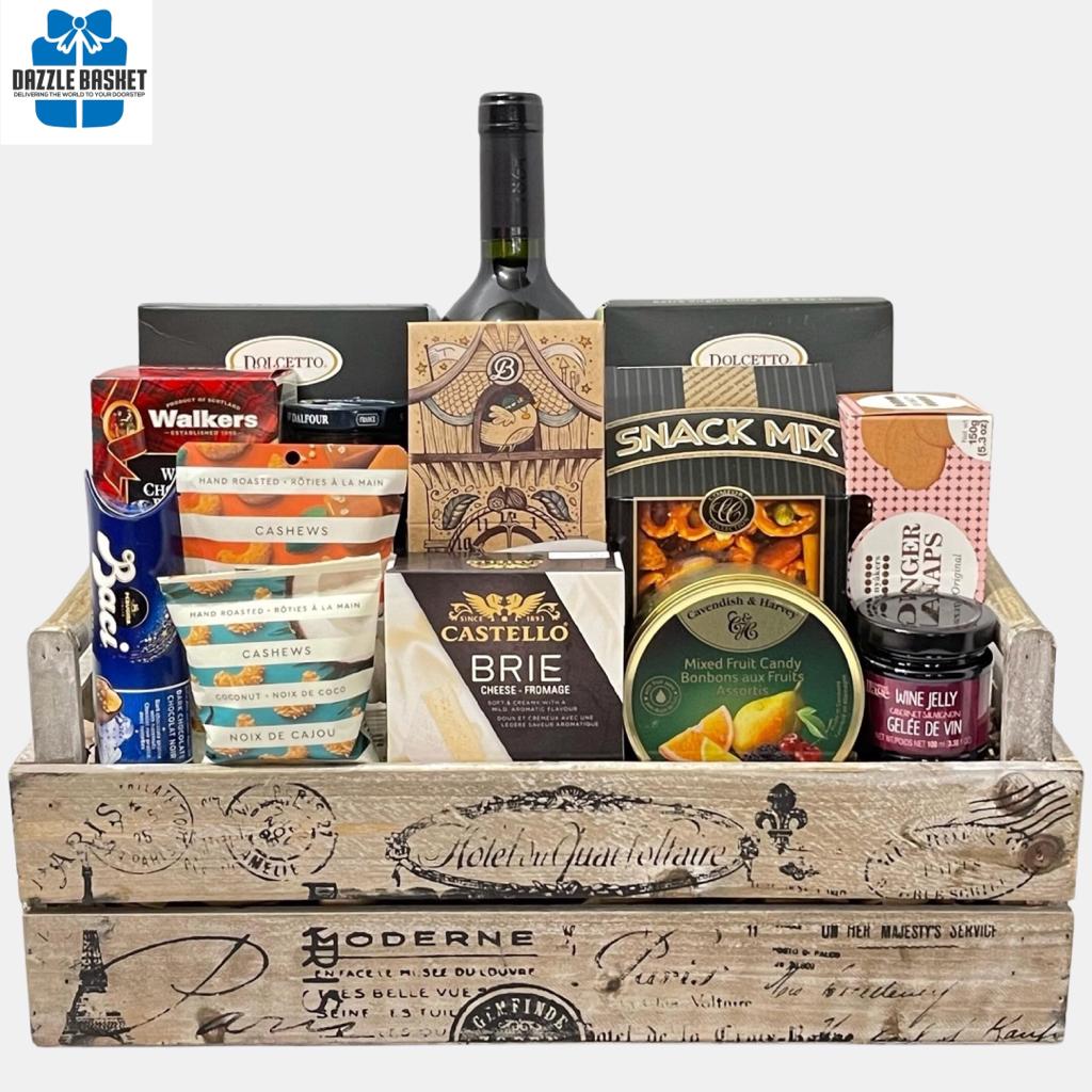 Finest gift baskets Calgary offers- An award winning wine with tasty gourmet snacks placed perfectly in a beautiful wooden container make up this  Calgary wine gift basket.