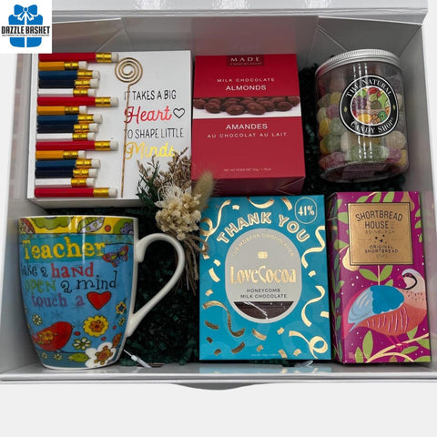 Finest Appreciation gift basket Calgary offers from Dazzle Basket- This Teacher gift basket includes tasty gourmet snacks & products such as a Teacher's mug & gratitude plaque.