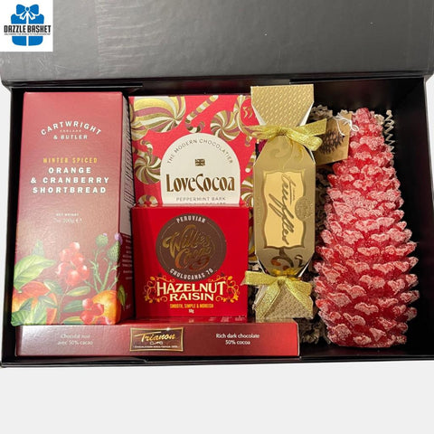 Gift baskets Calgary-Dazzle Basket- Alpine gift box that contains a beautiful red candle with food snacks for everyone to relish this Holiday season.