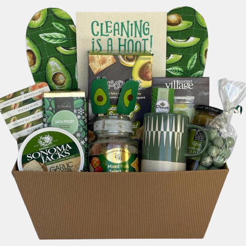 A made in Calgary housewarming gift basket that includes delicious gourmet sweets and number of household items arranged neatly in a large 14" market tray.