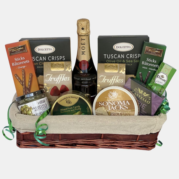 A champagne gift basket filled with delicious gourmet snacks and a bottle of champagne