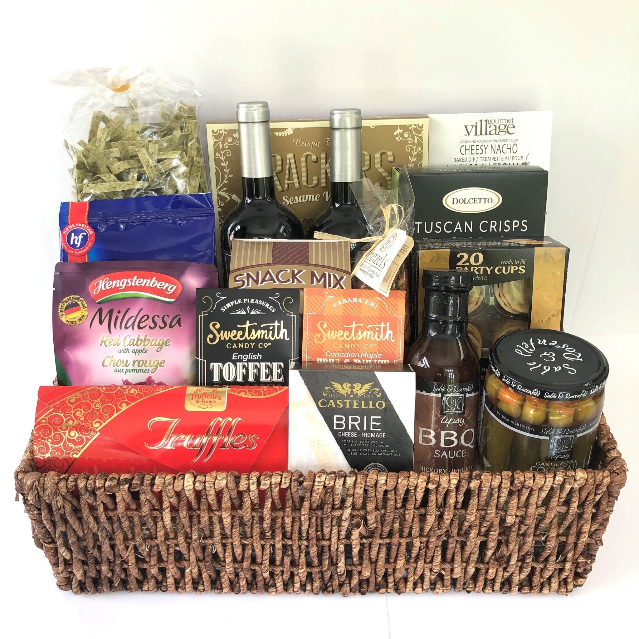 An award winning wine with tasty gourmet snacks placed perfectly in a beautiful metal container make up this  very popular made in Calgary wine gift basket.