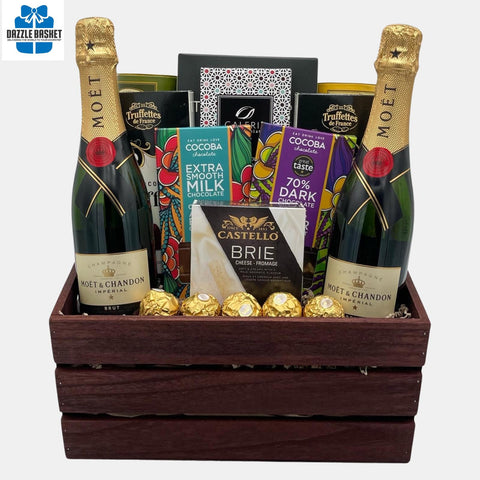 Calgary gift basket from Dazzle Basket that has two bottles of Moet champagne and delicious snacks and chocolates arranged in a wooden crate. A perfect gift delivery Calgary.