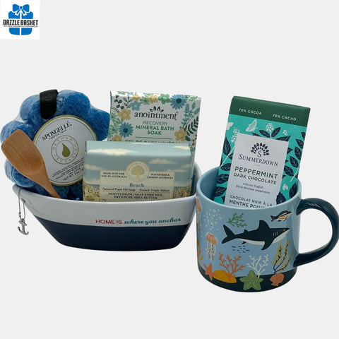 Spa gift baskets Calgary- A simple yet elegant beach themed gift that includes spa products, coffee mug and a beautiful boat shaped serving bowl 