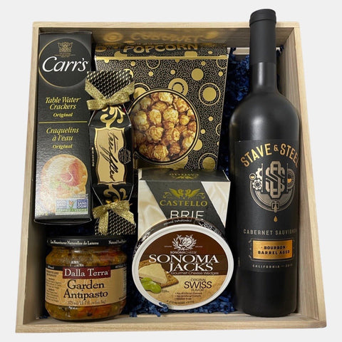 Made in a wooden crate, this made in Calgary wine gift basket includes an award winning bottle of wine and tasty gourmet snacks. 
