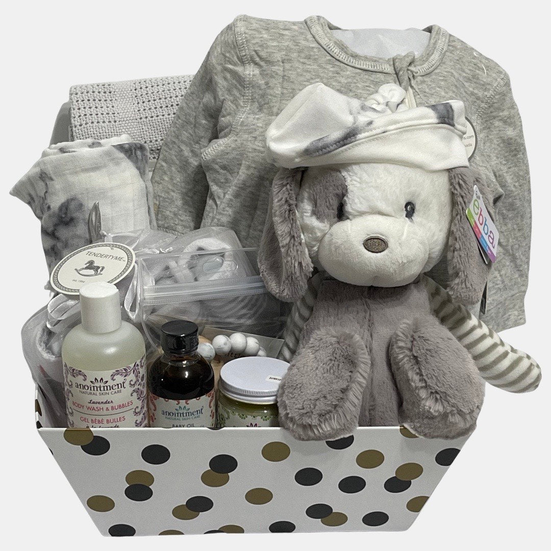 A made in Calgary gender neutral beautiful gift basket for a baby. It includes everything that baby will need during the first few months. Great gift for newborn.